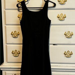 Black size S slightly above knee dress.